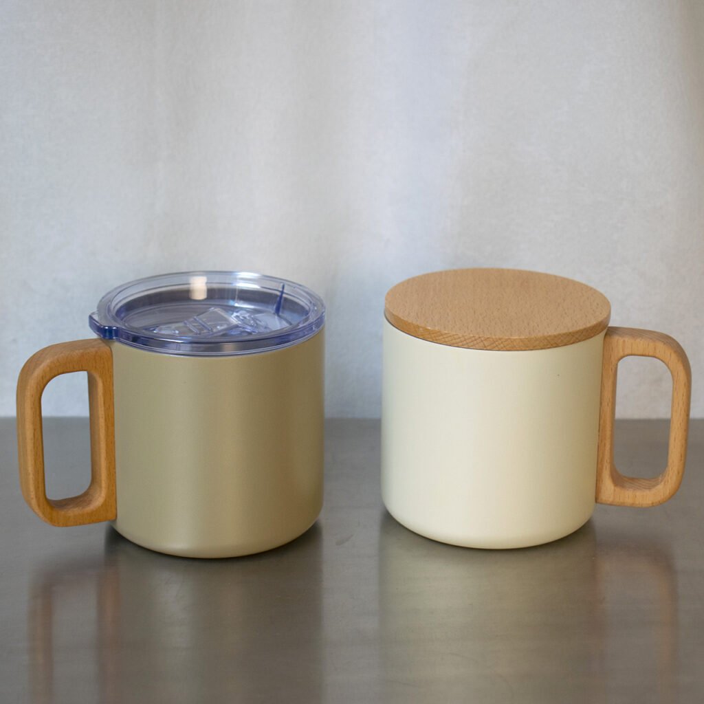 Custom double-wall stainless steel coffee mug prototypes with wooden handles and lid options